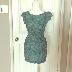 Teal BCBG sleeveless dress.